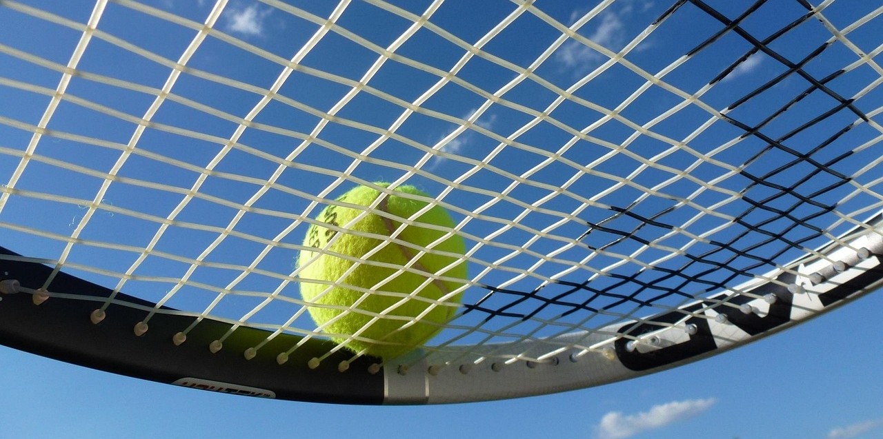 Man playing tennis at Celtic Haven